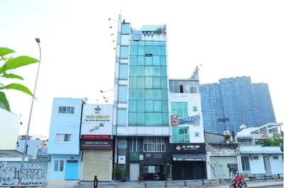 For Sale: Frontage Building on Nguyen Huu Canh Street, Binh Thanh - Prime Location